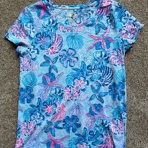 Lily T shirt blue pink white. Size medium. Slightly worn